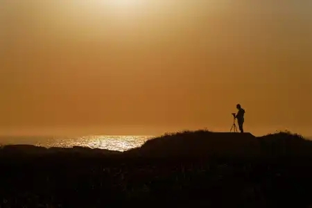 le photographe et le coucher de soleil